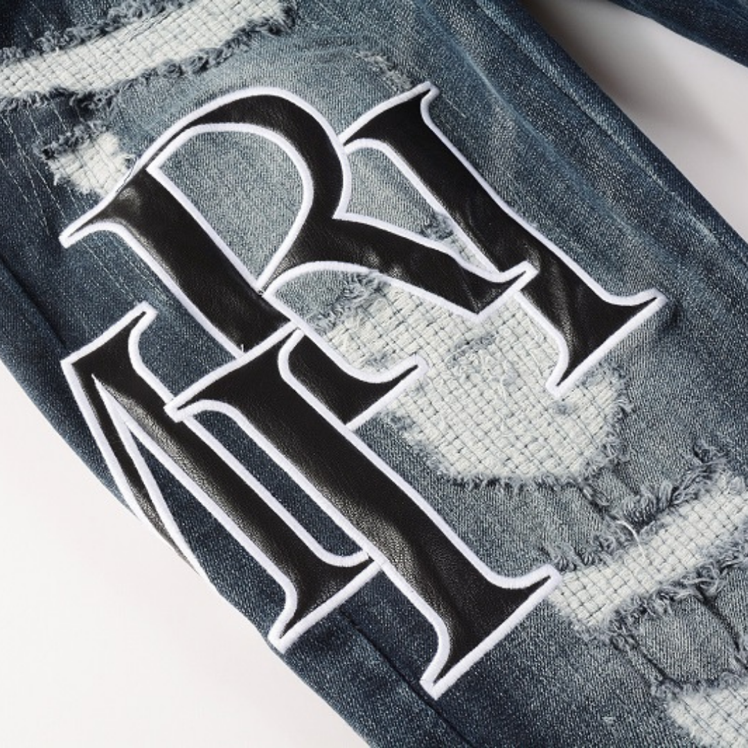 Amr Black Staggerd Logo Patch Jeans